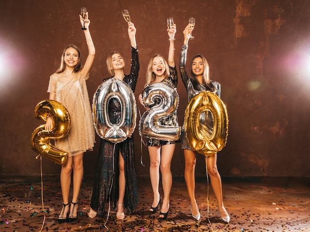 Free Photo | Beautiful women celebrating new year.happy gorgeous girls