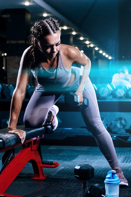 Premium Photo | Beautiful young black sportswoman in the gym