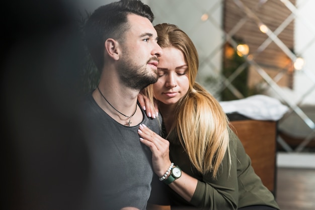 Free Photo | Beautiful young woman leaning on man's shoulder