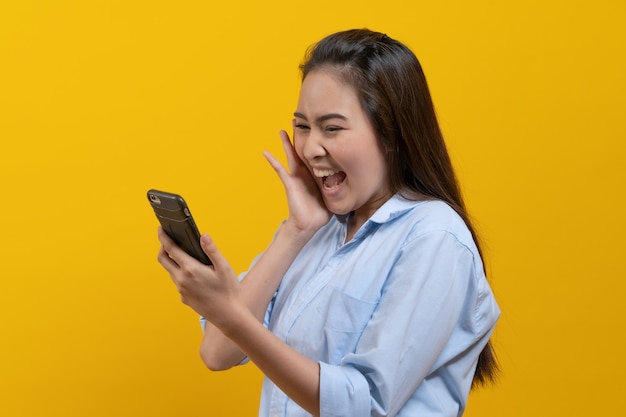 Premium Photo | Beautiful young woman looking at touchpad amaze with ...