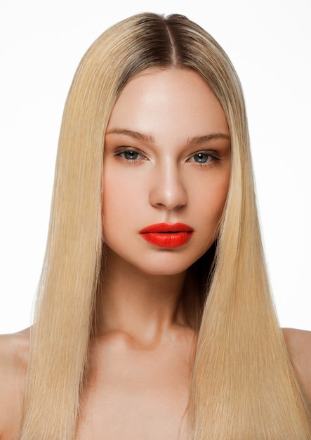 Beauty Fashion Model Portrait With Shiny Blonde Hairstyle With Red