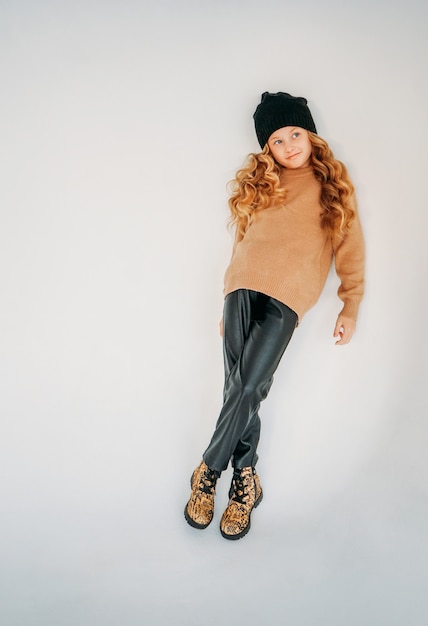 Beauty Fashion Portrait Of Smiling Curly Hair Tween Girl In Black