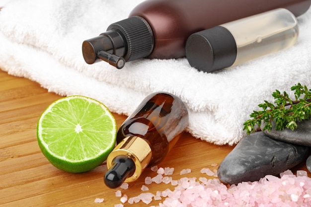 Premium Photo | Beauty treatment items for spa procedures on wooden table