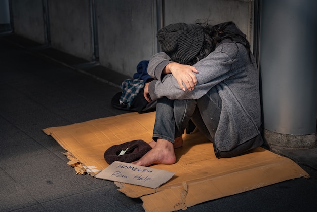 Beggars Homeless People Sitting On The Floor Premium Photo
