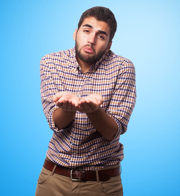 begging-arabic-man-on-blue-background-photo-free-download