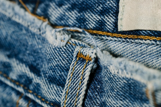 Belt loop from blue jeans close-up Photo | Free Download