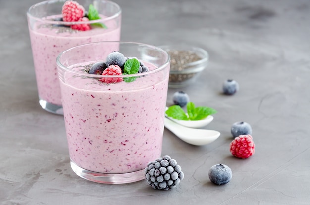 Premium Photo | Berry smoothies of yogurt chia seeds and frozen berries