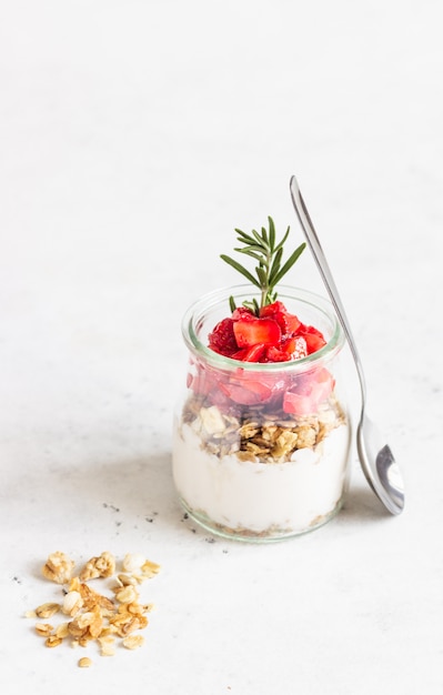 Download Premium Photo Berry Yogurt With Greek Yogurt Fresh Strawberries And Granola In Jars Healthy Breakfast Parfait In Glass Cup