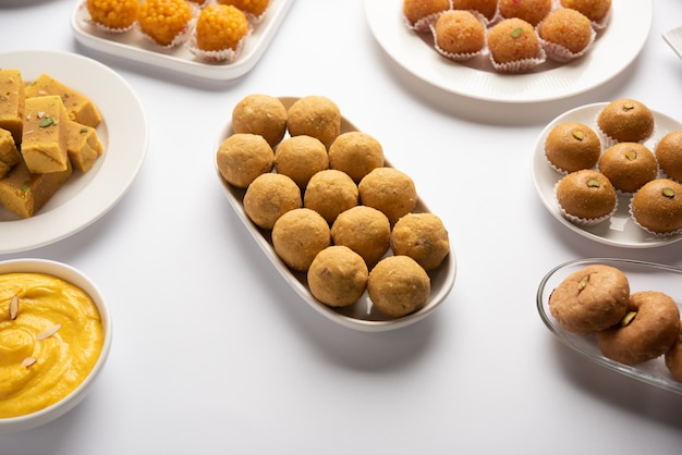 Free Photo | Besan ladoo are delicious sweet balls made with gram flour ...