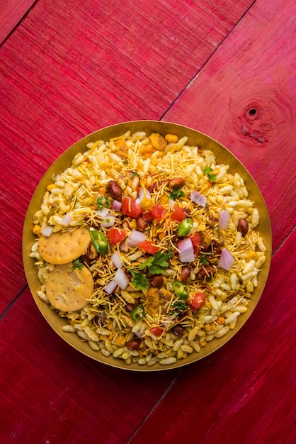 Premium Photo | Bhel puri is a savoury snack or chaat item from india ...