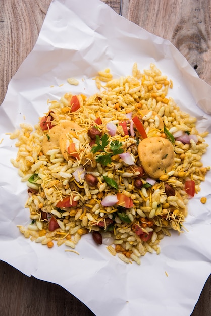 Premium Photo | Bhel puri is a savoury snack or chaat item from india ...