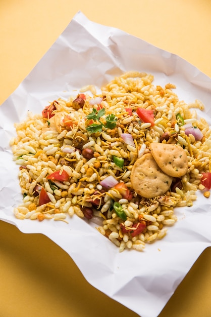 Premium Photo | Bhel puri is a savoury snack or chaat item from india ...