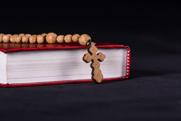 Bible and cross in religious concept Premium Photo