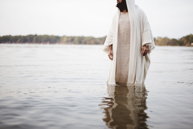 Free Photo Biblical Scene Of Jesus Christ Standing In The Water