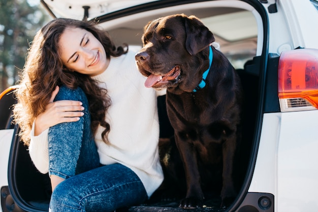 Premium Photo | Big black dog in car