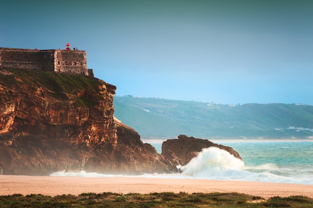 Premium Photo | Big waves on the coast of atlantic ocean in nazare ...