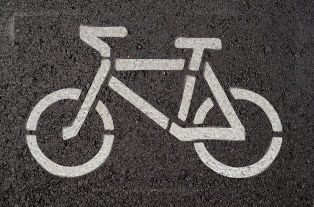 Premium Photo | Bike symbol on asphalt road