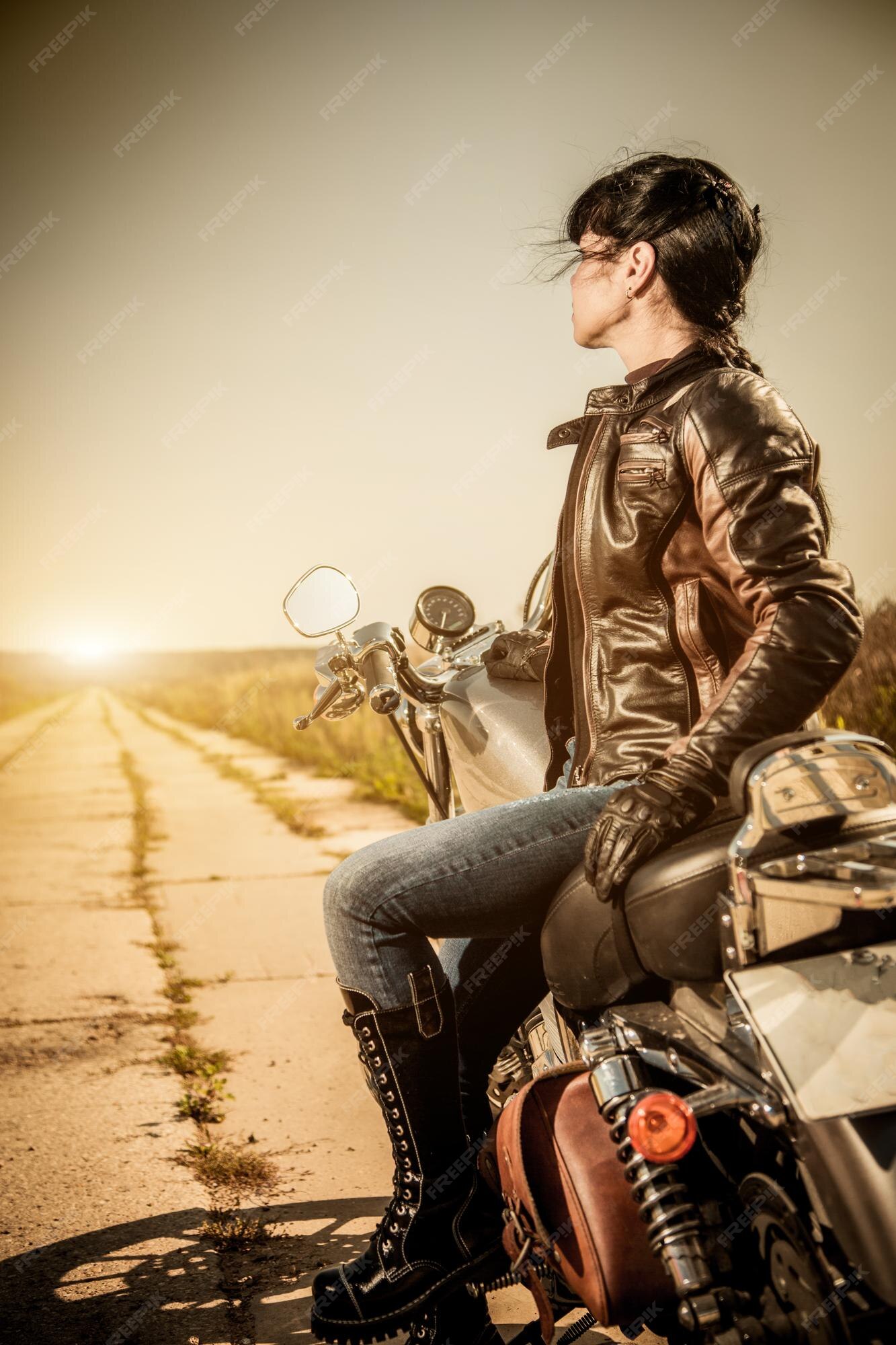 Premium Photo Biker Girl Sits On A Motorcycle 0558