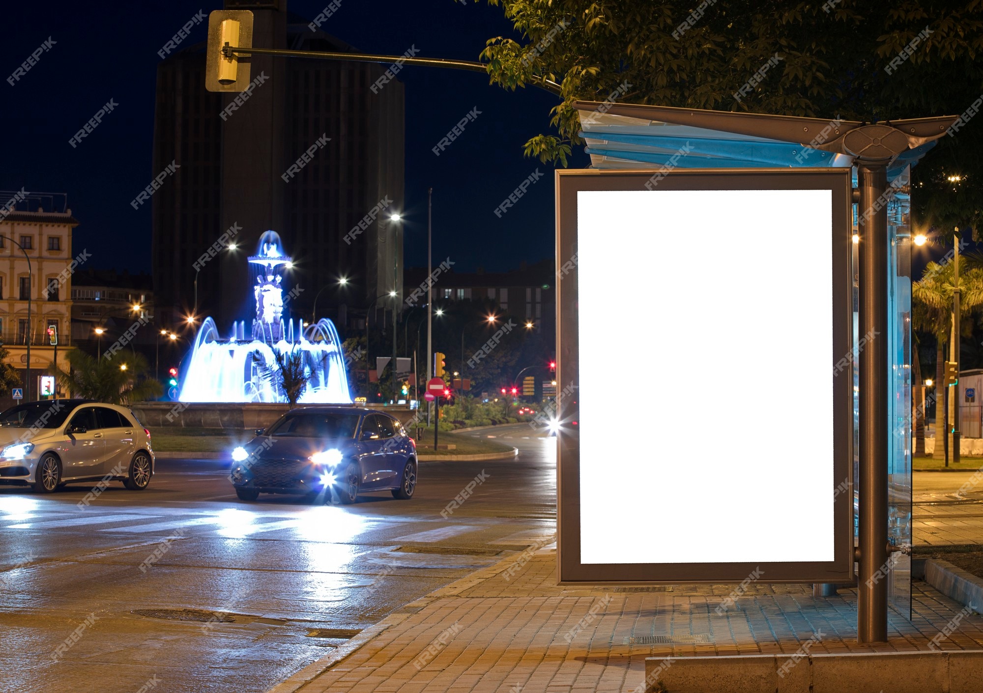 Premium Photo | Billboard with light in the center of the city at night