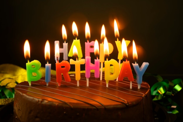 Premium Photo | Birthday cake with candles on a yellow background