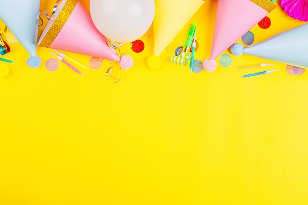 Premium Photo | Birthday decor on yellow background