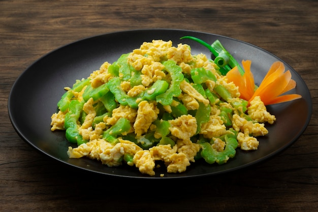 Premium Photo | Bitter gourd stir-fried with eggs