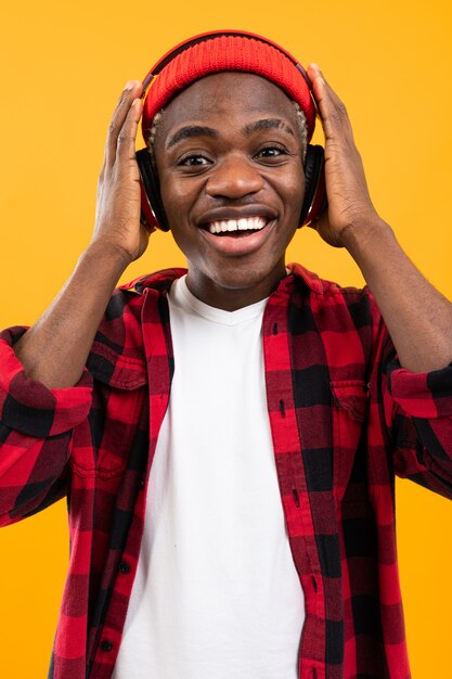 Premium Photo Black American Guy Listening To Music On Headphones