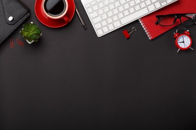 Premium Photo Black Background Red Coffee Cup Note Pad Alarm Clock Flower Diary Scores Keyboard Empty Space Desktop