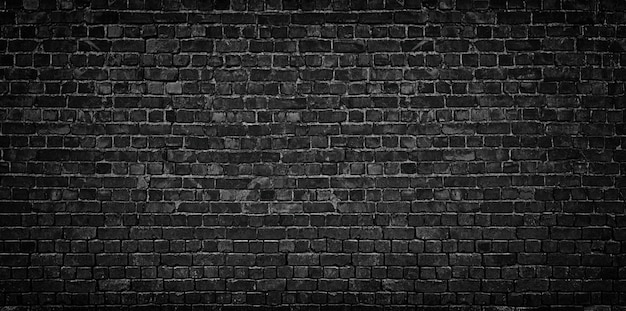黒レンガの壁の背景 プレミアム写真