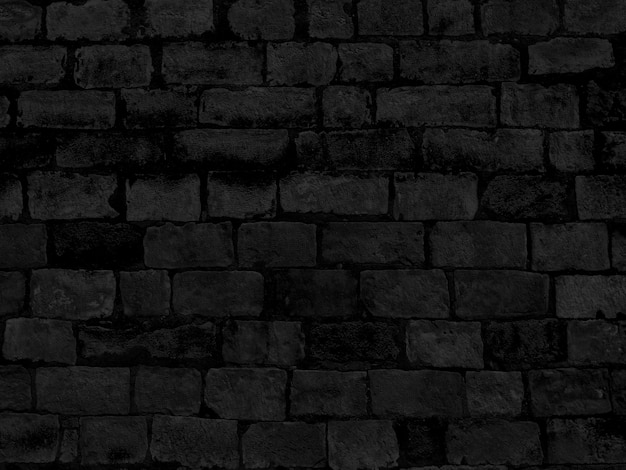 Black brick wall texture of a building. | Premium Photo