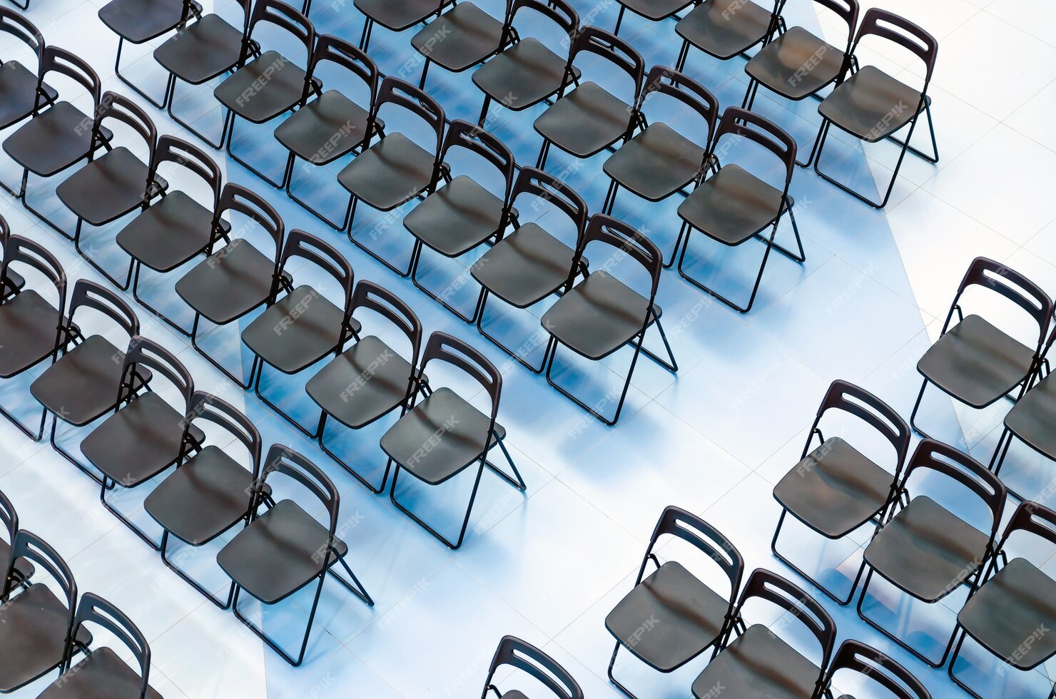 Premium Photo | Black chairs set in the audience, top view.