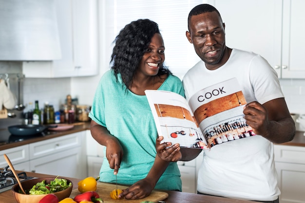 Premium Photo | Black couple cooking in the kitchen together