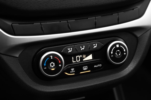 Premium Photo | Black detail with the air conditioning button, the ...