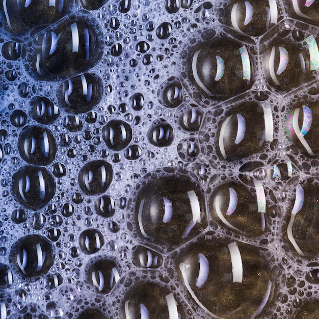 Black liquid with many blobs Free Photo