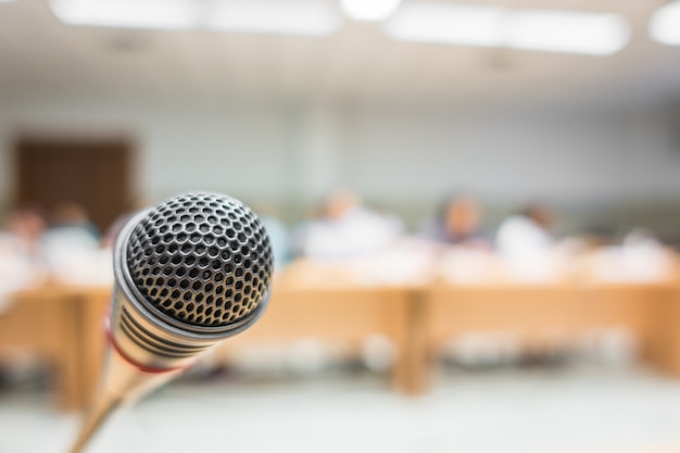 Black microphone in conference room ( filtered image processed v Free Photo