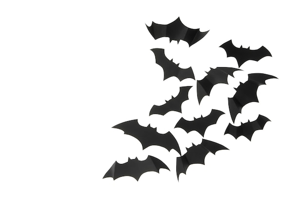 Premium Photo | Black paper bats isolated on white