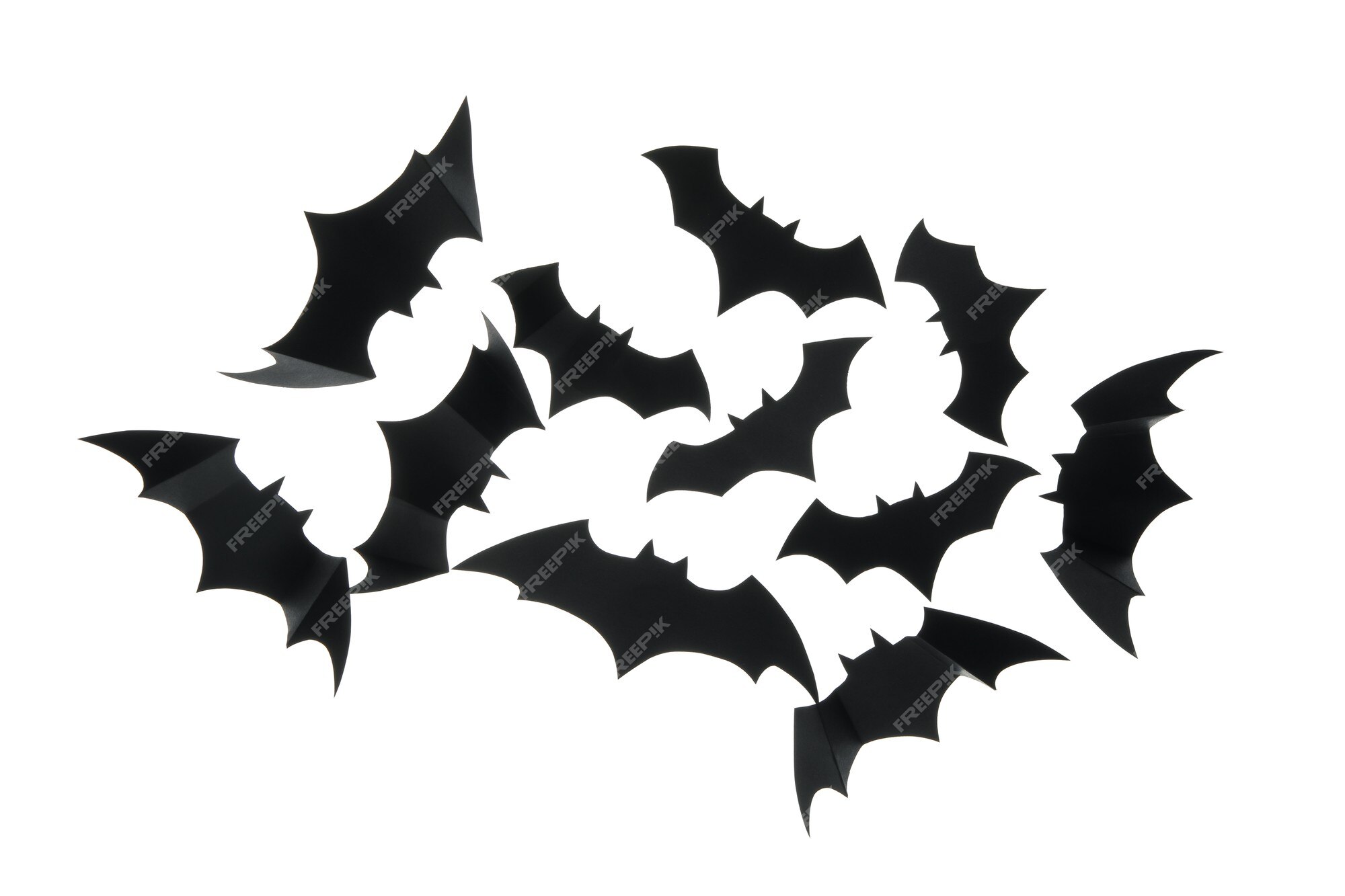 Premium Photo | Black paper bats isolated on white