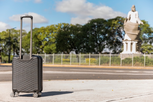 black plastic suitcase