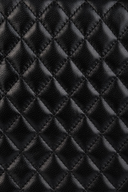 Premium Photo | Black quilted leather background