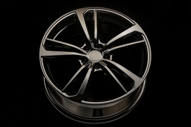 Premium Photo | Black stylish rim alloy wheel on a dark background ...