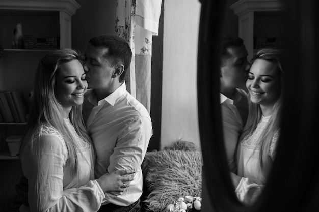 Premium Photo | Black and white couple in love with reflection in mirror