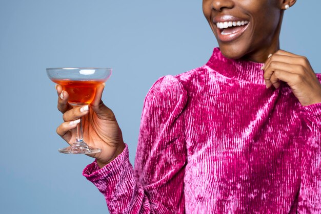 Premium Photo | Black woman holding a drink