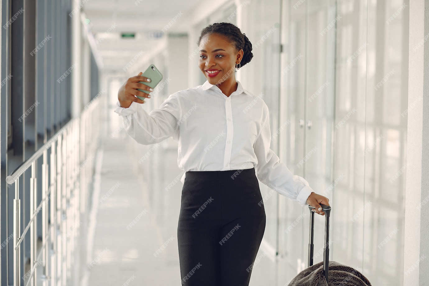 Free Photo | Black woman with suitcase at the airport