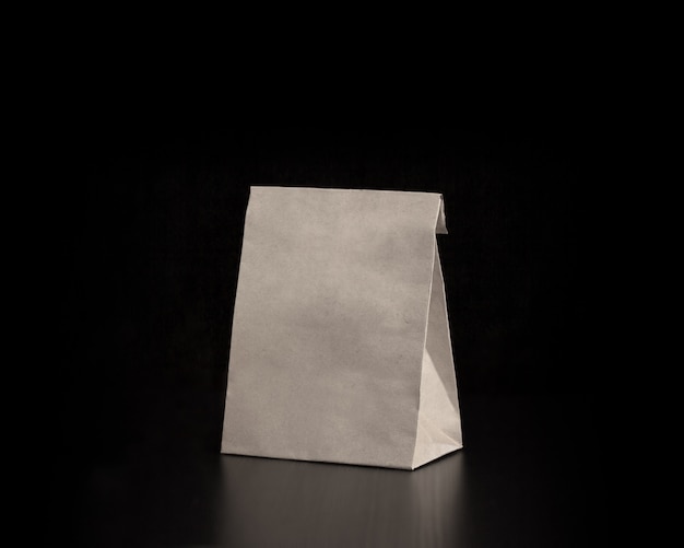 Download Premium Photo | Blank craft paper bag on wooden background. responsive design mockup.
