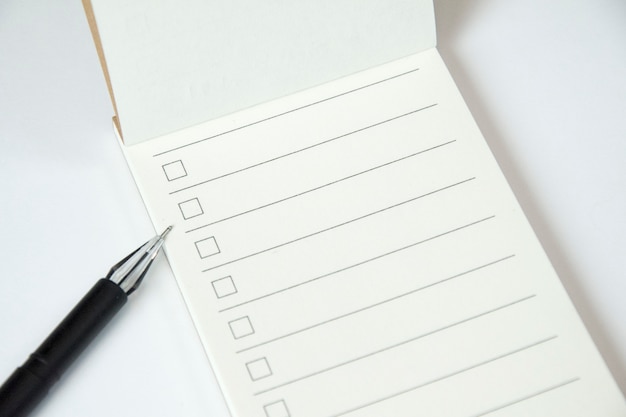 blank checklist with pen
