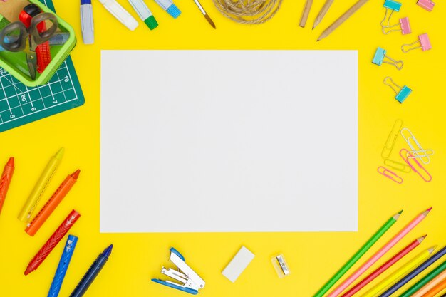 Download Blank paper page mockup on yellow table with office tools. copy space | Premium Photo