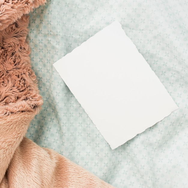 Free Photo | Blank paper sheet on bed