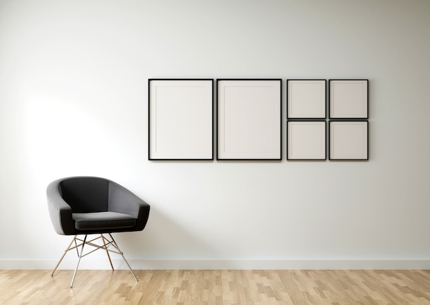 Premium Photo | Blank picture frame hanging on the wall in a living room.