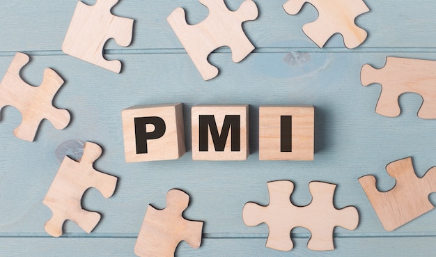Premium Photo | Blank puzzles and wooden cubes with the pmi project ...