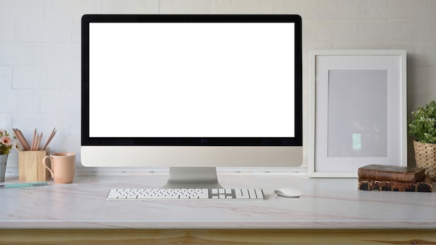 Premium Photo | Blank screen desktop computer on workspace.